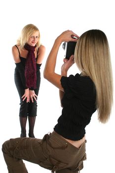 Beautiful felame photographer taking picture of a model