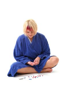 Sick girl in housecoat with a cup of tea