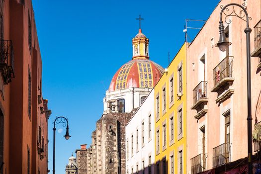 Scenic view of colorful houses and church roof in Mexico city, Mexico