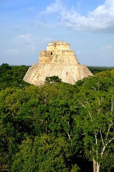 Landscape vertical view of Uxmal archeological site with pyramid, Mexico