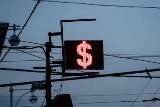 RUSSIA, Moscow: A screen in Moscow briefly displays a dollar sign as it shows Russia's ruble trading at record lows against other currencies on January 21, 2016, as reported 12-year lows in oil prices continue to impact on the economy.