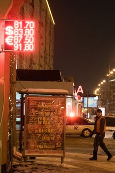 RUSSIA, Moscow: A screen in Moscow shows Russia's ruble trading at record lows against the dollar on January 21, 2016, as reported 12-year lows in oil prices continue to impact on the economy.