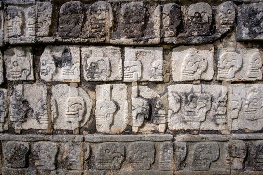 Detail of stone carvings in famous archeological site Chichen Itza, Mexico