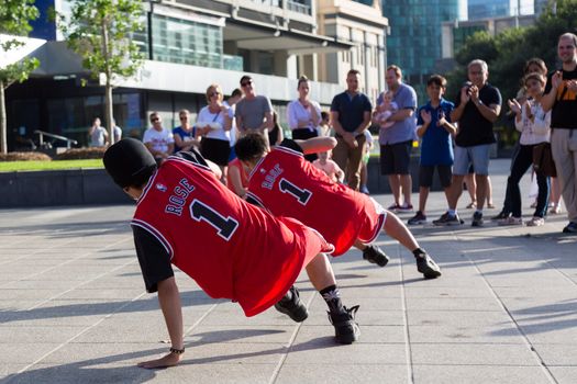 MELBOURNE/AUSTRALIA - JANUARY 22: Street performers entertaining crowds in Southbank during the 2016 Australian Open tennis tournament.