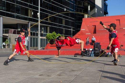 MELBOURNE/AUSTRALIA - JANUARY 22: Street performers entertaining crowds in Southbank during the 2016 Australian Open tennis tournament.