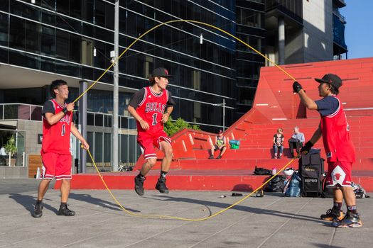 MELBOURNE/AUSTRALIA - JANUARY 22: Street performers entertaining crowds in Southbank during the 2016 Australian Open tennis tournament.