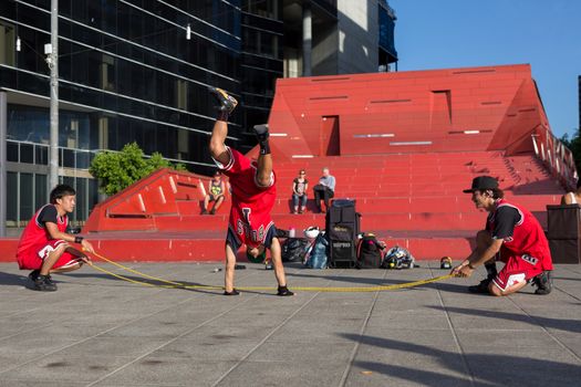 MELBOURNE/AUSTRALIA - JANUARY 22: Street performers entertaining crowds in Southbank during the 2016 Australian Open tennis tournament.