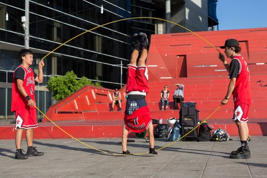 MELBOURNE/AUSTRALIA - JANUARY 22: Street performers entertaining crowds in Southbank during the 2016 Australian Open tennis tournament.