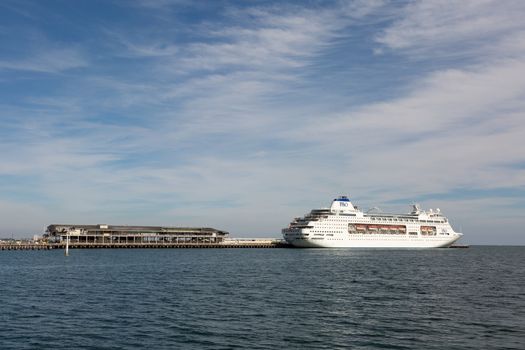 A large luxury Cruise Liner, Pacific Pearl is docked at Melbourne's Station Peir for a stop over.