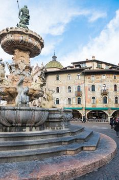 Detail of the Neptune fountain in Cathedral Square, Trento, Italy
