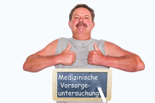 Thumbs up! man shows two thumbs up. Underneath a chalkboard with inscription Preventive medical checkup on white background