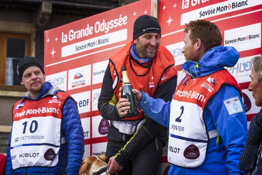 TERMIGNON, VANOISE, FRANCE - JANUARY 20 2016 - The podium Remy COSTE the winner of the GRANDE ODYSSEE the hardest mushers race, the 2nd Jimmy PETTERSSON and 3th named Jean-Philippe PONTHIER, Vanoise, Alps