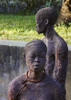 A statue in Stone Town, Zanzibar dipicting and mourning the African slave trade