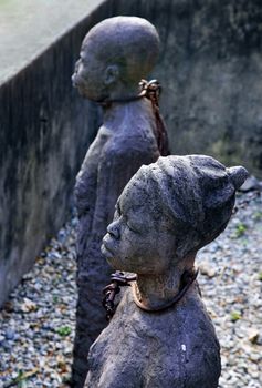 A statue in Stone Town, Zanzibar dipicting and mourning the African slave trade