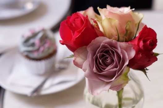 Cup cake with rose flowers