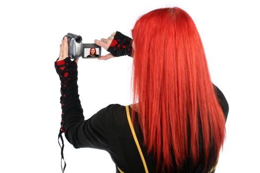 Teen recording with her video camera