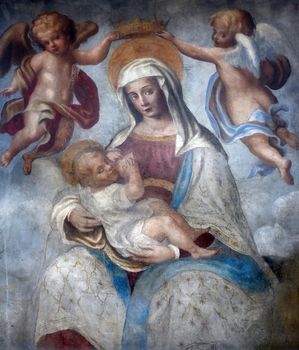 Blessed Virgin Mary with baby Jesus, street wall painting, Parma, Italy