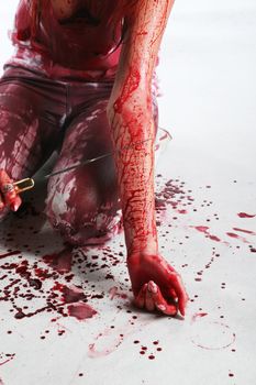 Beautiful red hair girl covered in blood