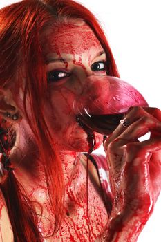 Beautiful red hair girl covered in blood