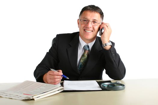 Happy business man busy on a phone, signing a contract and reading financial news