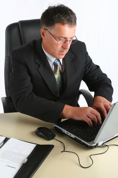 Portrait of businessman with computer