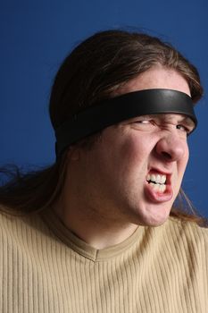 Man with a belt on his had