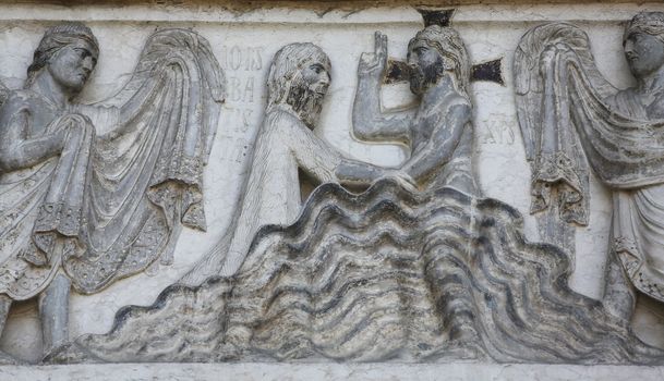 Baptism of Jesus Christ, relief at the baptistry from Benedetto Antelami, Parma, Emilia Romagna, Italy
