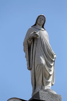 Statue of saint, church of Saint John the Evangelist. Parma. Emilia-Romagna. Italy