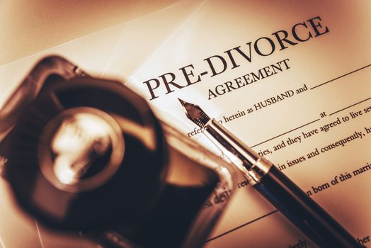 Pre Divorce Agreement Document, Ink-Bottle and the Fountain Pen. Divorce Documentation Photo Concept.