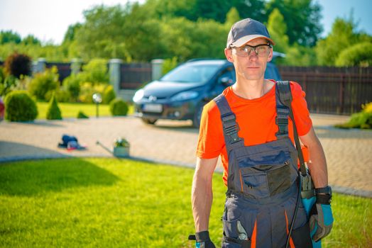 Occupation Professional Gardener. Young Gardener Ready to Get Work.