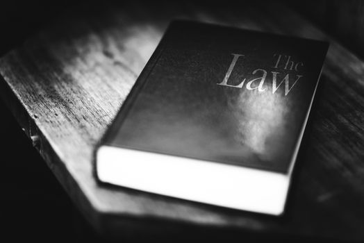 The Law Book. Black and White Law Book Concept Photo.