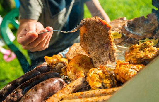 Barbecue Time. Grilling Time. Various of Meats and Sausages on the Hot Grill. 