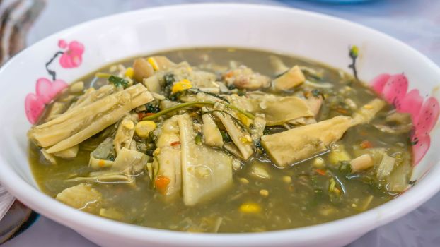 Thai spicy soup with bamboo shoots and herbs  , Thai rustic style food