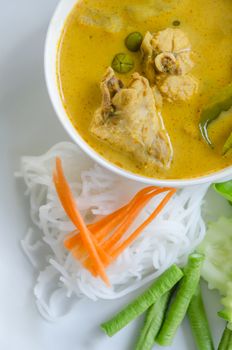 Thai rice vermicelli served with yellow curry