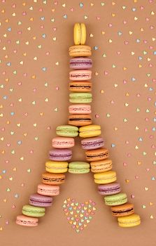 Macarons Eiffel Tower french sweet colorful,multicolored hearts.Fresh pastel delicious dessert on chocolate retro vintage background.Love,Valentines Day,romantic                                       
