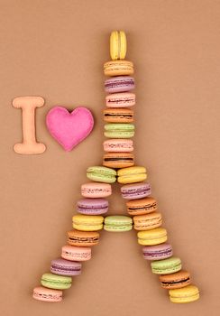 Macarons. I love Eiffel Tower french sweet colorful, pink heart. A lot of fresh  pastel delicious biscuit dessert on chocolate retro vintage background.                                           