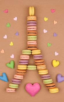 Macarons Eiffel Tower french sweet colorful,multicolored hearts.Fresh pastel delicious dessert on chocolate retro vintage background.Love,Valentines Day,romantic                                       