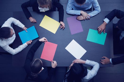 Group of business people with blank colorful paper, new project concept