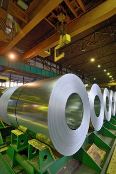 rolls of steel sheet stored in warehouse