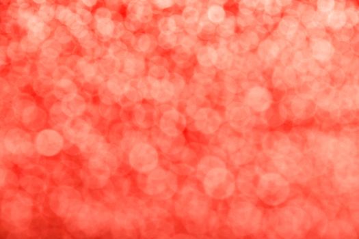 Coral red festive glitter tender bright magic light circles abstract blur effect background
