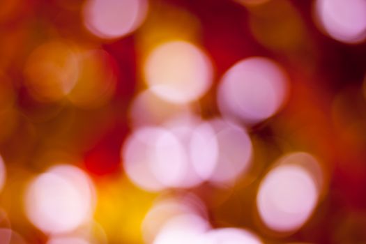 Bokeh light background pink and orange colored

