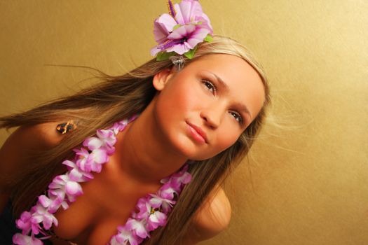 Summer/hawai girl on gold background
