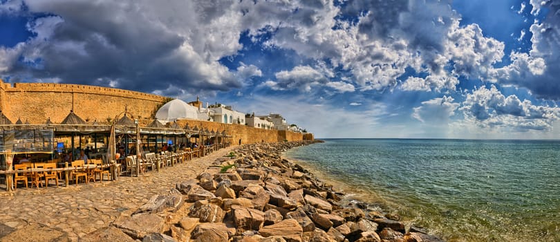 HAMMAMET, TUNISIA - OCT 2014: Cafe on stony beach of ancient Medina on October 6, 2014 in Hammamet, Tunisia