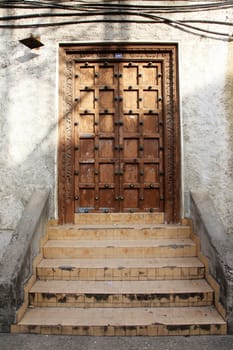 Old wooden door at Stone Town the capital of Zanzibar island East Africa.