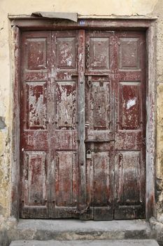 Old wooden door at Stone Town the capital of Zanzibar island East Africa.