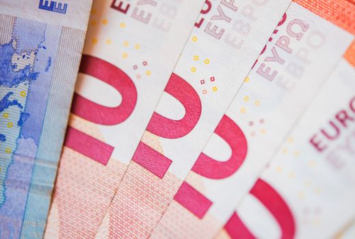 Pinky Ten Euro Bills. Euro Currency Closeup Photo.