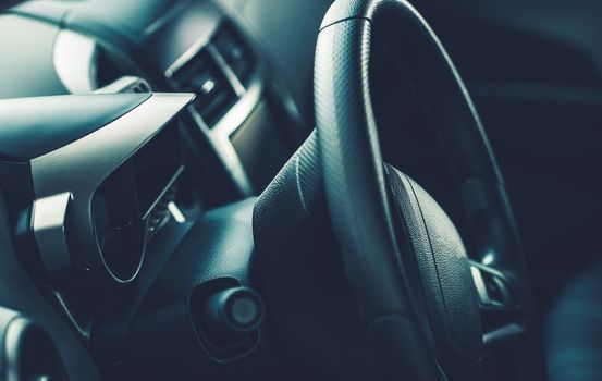 Car Steering Wheel and the Modern Car Interior. Modern Transportation.
