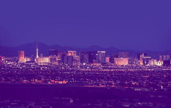 Las Vegas Cityscape at Night in Vintage Purple Color Grading. Las Vegas, Nevada, United States.