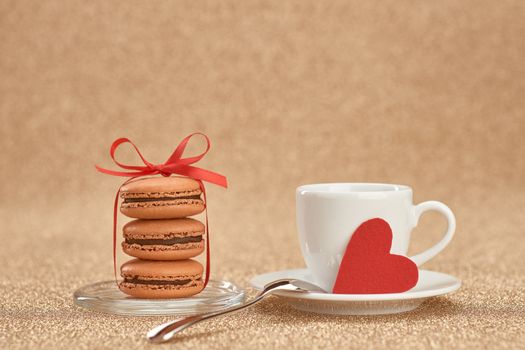 Macarons french dessert, cup of coffee, red heart .Vintage retro romantic style.Unusual creative art greeting card, shiny background,bokeh. Love,Valentines Day