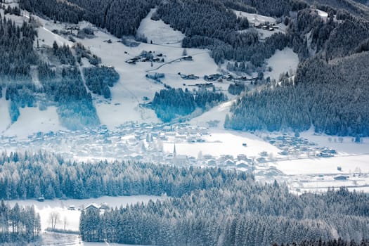 Wintery village in alpine valley, Tyrol, Austria